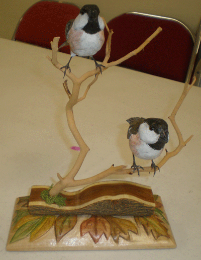 carved chickadees